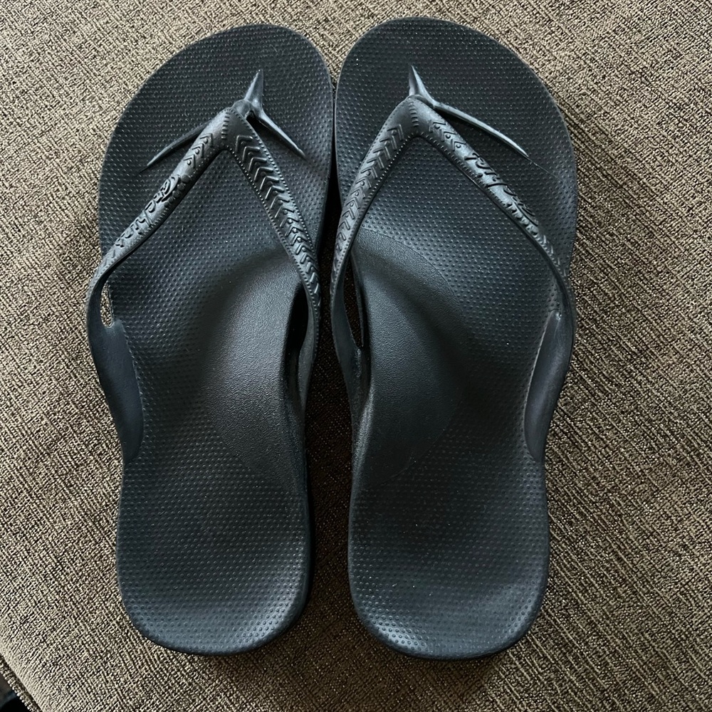 Archie’s flip flops